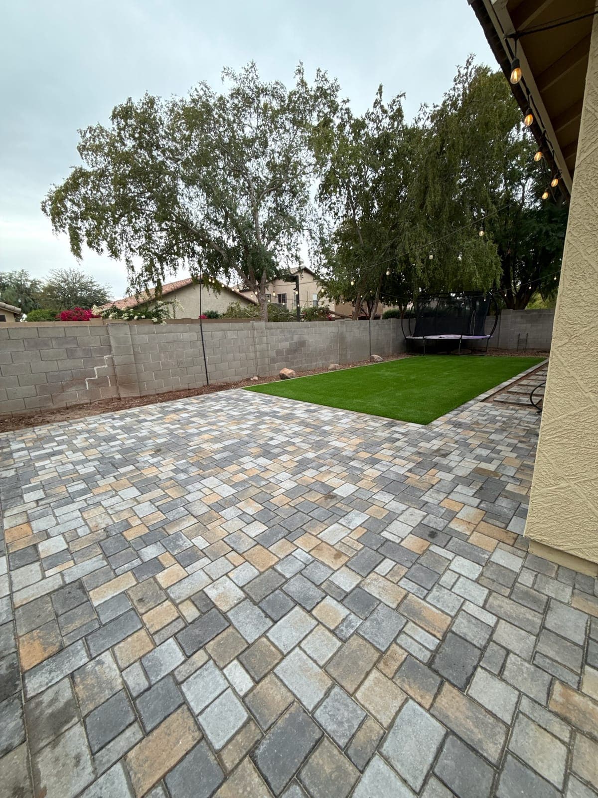 Paver Extension — Concrete Pavers, Turf Grass, Concrete Block Wall in the Phoenix Valley, Arizona